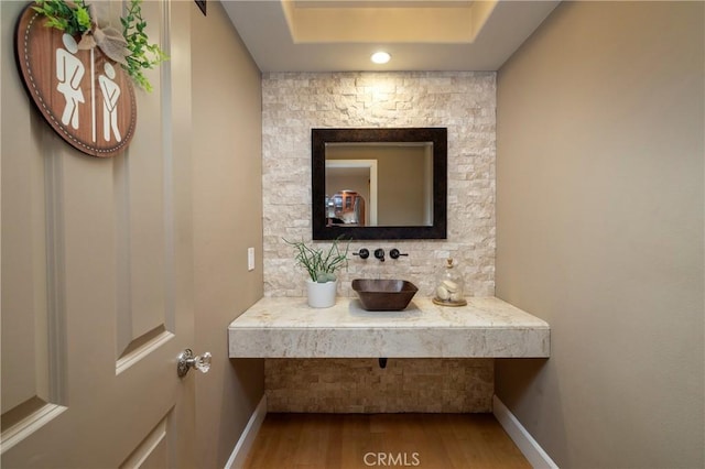 16561 Wanderer Ln, Huntington Beach, CA 92649 - bathroom with wood finished floors, baseboards, and a sink