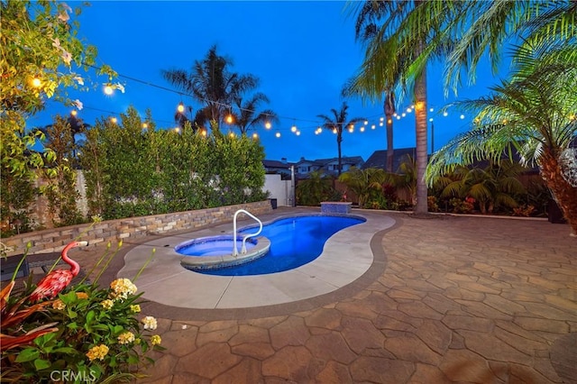 16561 Wanderer Ln, Huntington Beach, CA 92649 - view of swimming pool featuring a patio and a pool with connected hot tub