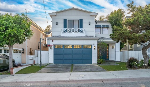 2001 Oak Ave, Manhattan Beach, CA 90266 - view of front facade with brick siding, an attached garage, and concrete driveway