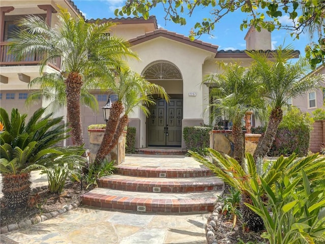 2237 Sageleaf Cir, Corona, CA 92882 - property entrance featuring stucco siding and a tiled roof