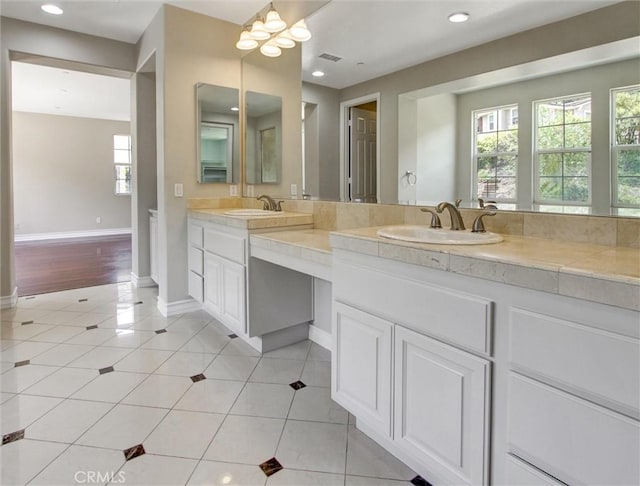 2237 Sageleaf Cir, Corona, CA 92882 - bathroom with double vanity, tile patterned floors, baseboards, recessed lighting, and a chandelier