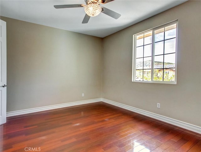 2237 Sageleaf Cir, Corona, CA 92882 - unfurnished room with wood-type flooring, baseboards, and ceiling fan
