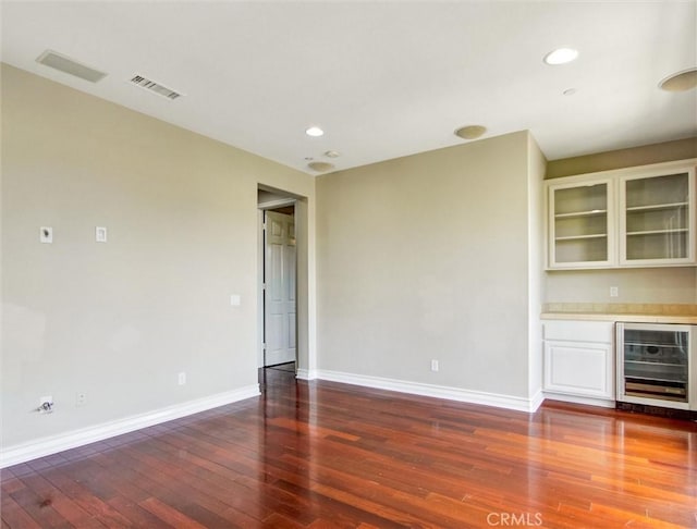 2237 Sageleaf Cir, Corona, CA 92882 - indoor dry bar with beverage cooler, hardwood / wood-style flooring, baseboards, and recessed lighting