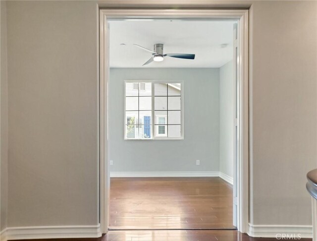 2237 Sageleaf Cir, Corona, CA 92882 - empty room featuring hardwood / wood-style flooring, a ceiling fan, and baseboards