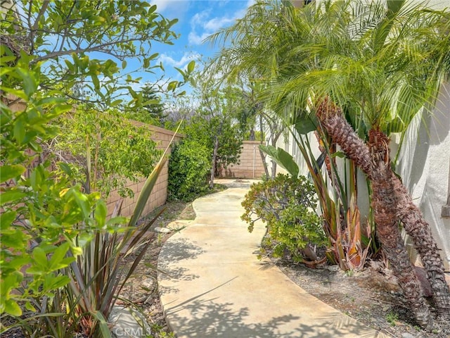 2237 Sageleaf Cir, Corona, CA 92882 - view of property exterior featuring a fenced backyard and a patio