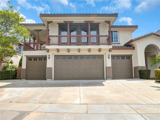 2237 Sageleaf Cir, Corona, CA 92882 - mediterranean / spanish house with an attached garage, stucco siding, and driveway