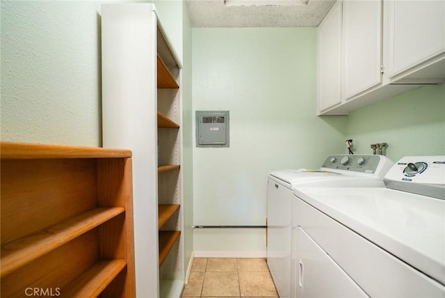5631 Lake Park Way Unit 2, La Mesa, CA 91942 - laundry area featuring cabinet space, washer and dryer, light tile patterned floors, and baseboards