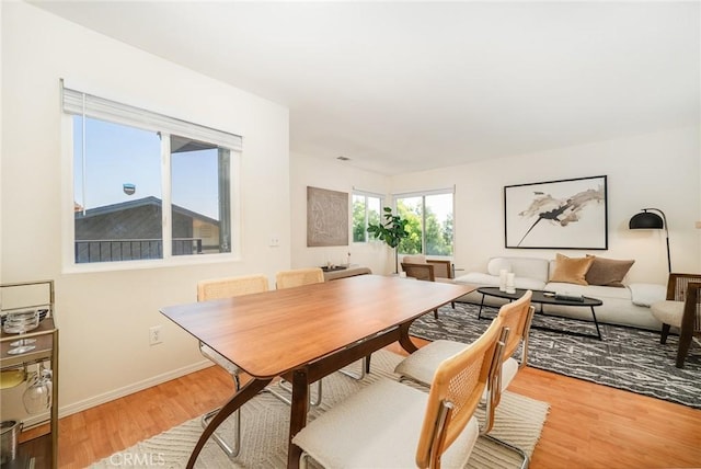 5631 Lake Park Way Unit 2, La Mesa, CA 91942 - dining space with light wood finished floors and baseboards