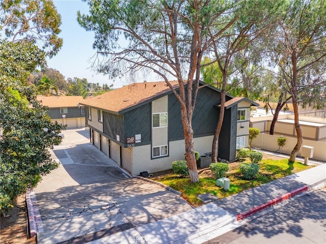 5631 Lake Park Way Unit 2, La Mesa, CA 91942 - view of front of house featuring driveway and stucco siding