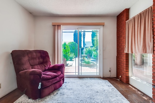1702 Lark Tree Way, Hacienda Heights, CA 91745 - sitting room with wood finished floors and a textured ceiling