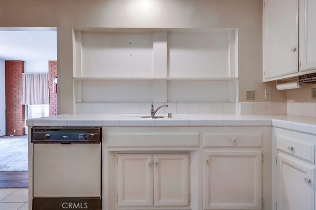 1702 Lark Tree Way, Hacienda Heights, CA 91745 - kitchen with white dishwasher, white cabinetry, and tile countertops
