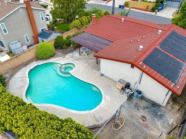 9336 Nalini Ct, Santee, CA 92071 - view of pool featuring a patio area, a pool with connected hot tub, and a fenced backyard
