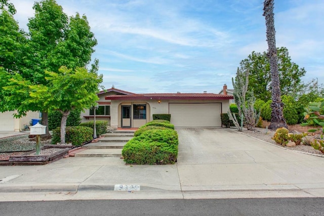 9336 Nalini Ct, Santee, CA 92071 - ranch-style house featuring stucco siding, a garage, and driveway