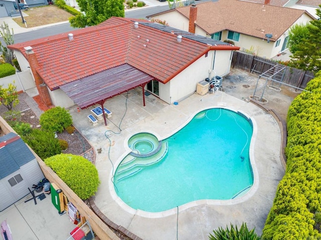 9336 Nalini Ct, Santee, CA 92071 - view of pool featuring a patio area, a fenced backyard, and a pool with connected hot tub