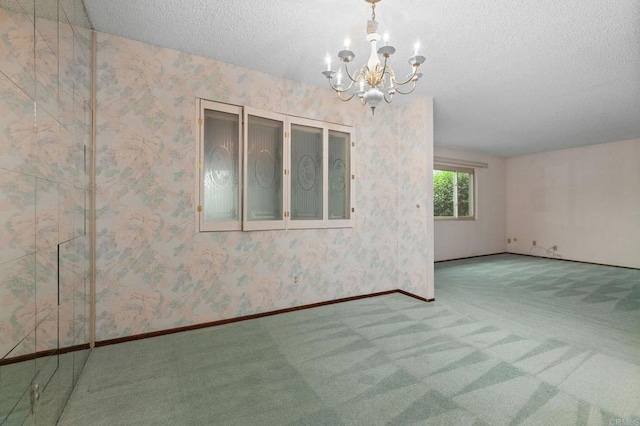 9336 Nalini Ct, Santee, CA 92071 - carpeted spare room with a chandelier, a textured ceiling, and wallpapered walls