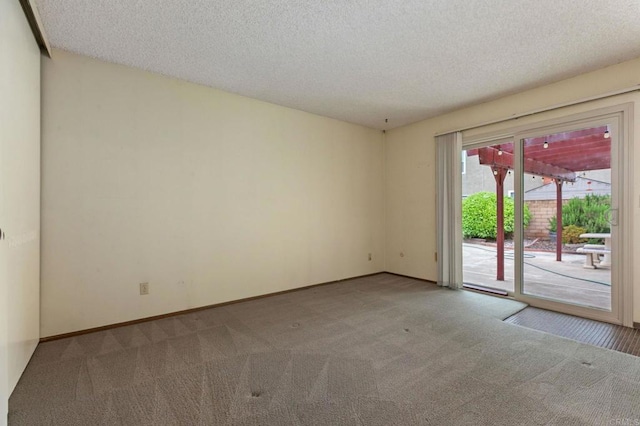 9336 Nalini Ct, Santee, CA 92071 - carpeted empty room with a textured ceiling and baseboards