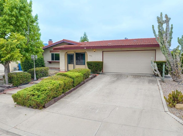 9336 Nalini Ct, Santee, CA 92071 - single story home featuring an attached garage, concrete driveway, a tiled roof, stucco siding, and a chimney