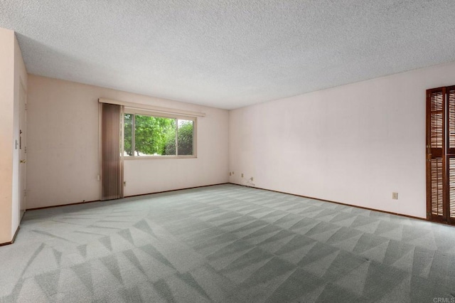 9336 Nalini Ct, Santee, CA 92071 - unfurnished room featuring carpet flooring and a textured ceiling