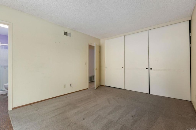 9336 Nalini Ct, Santee, CA 92071 - unfurnished bedroom featuring ensuite bathroom, carpet, a textured ceiling, and a closet