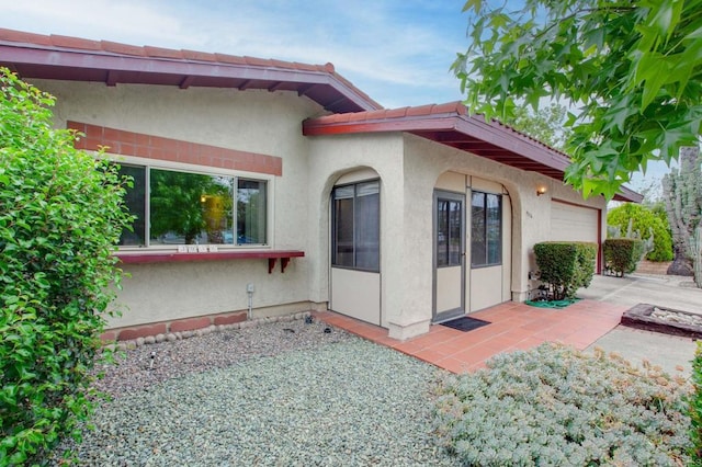 9336 Nalini Ct, Santee, CA 92071 - back of property featuring a garage and stucco siding