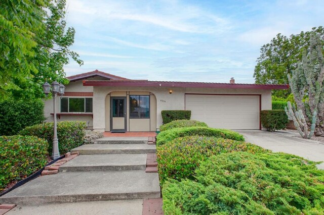 9336 Nalini Ct, Santee, CA 92071 - ranch-style home featuring stucco siding, a garage, and driveway