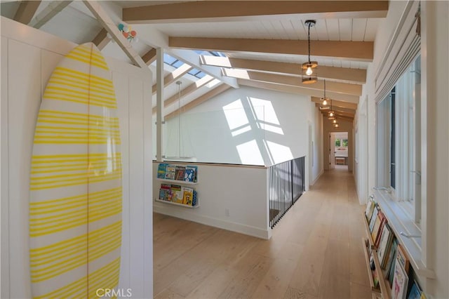 2104 Flournoy Rd, Manhattan Beach, CA 90266 - hall with a skylight, light wood finished floors, and baseboards