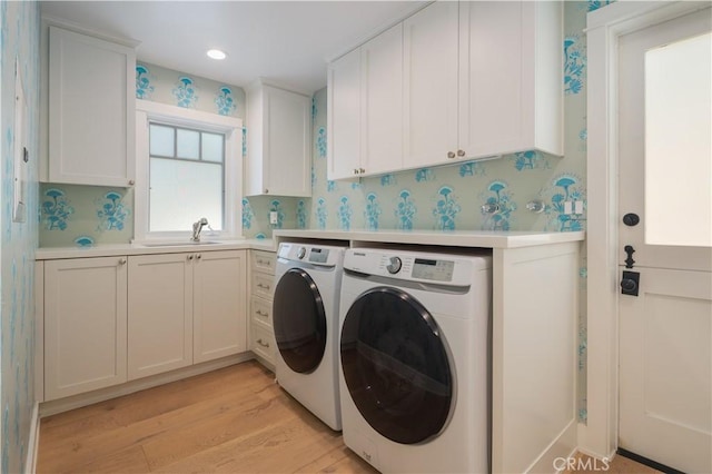 2104 Flournoy Rd, Manhattan Beach, CA 90266 - washroom featuring washer and clothes dryer, cabinet space, wallpapered walls, light wood finished floors, and recessed lighting