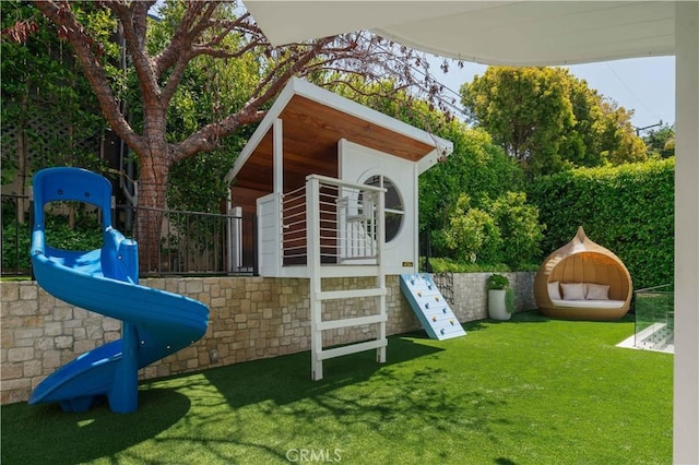 2104 Flournoy Rd, Manhattan Beach, CA 90266 - view of jungle gym featuring a lawn