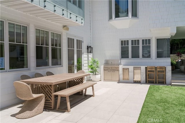 2104 Flournoy Rd, Manhattan Beach, CA 90266 - view of patio / terrace featuring outdoor dining space, a grill, and a balcony