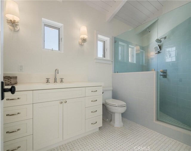 2104 Flournoy Rd, Manhattan Beach, CA 90266 - bathroom featuring healthy amount of natural light, beamed ceiling, a stall shower, toilet, and vanity