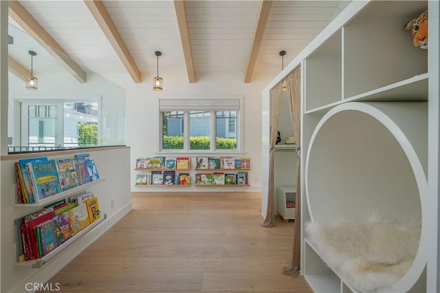 2104 Flournoy Rd, Manhattan Beach, CA 90266 - game room featuring plenty of natural light, wood finished floors, beam ceiling, and baseboards