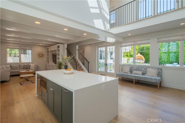 2104 Flournoy Rd, Manhattan Beach, CA 90266 - kitchen with open floor plan, plenty of natural light, a kitchen island, light wood finished floors, and recessed lighting
