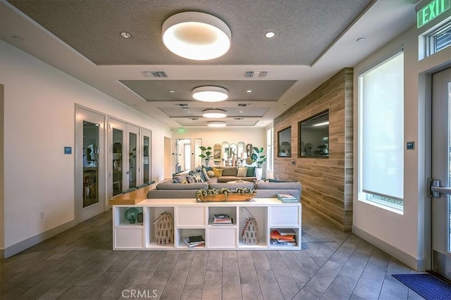 9630 Nova Pl, Rancho Cucamonga, CA 91730 - kitchen with an accent wall, baseboards, open floor plan, wood finished floors, and recessed lighting