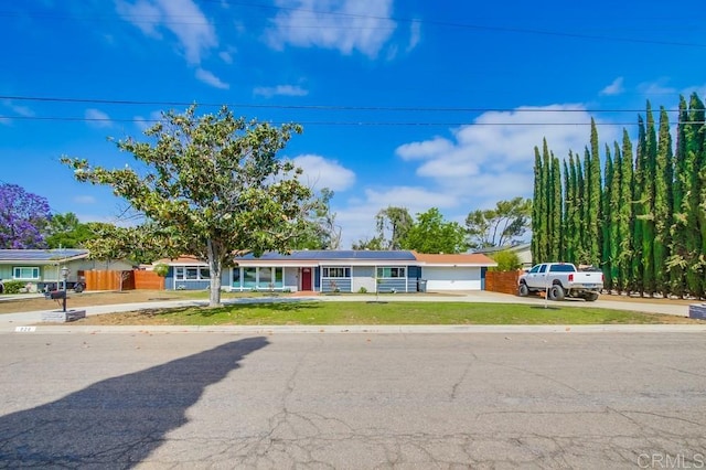 826 Terra Ln, El Cajon, CA 92019 - ranch-style home with concrete driveway, a front yard, and an attached garage