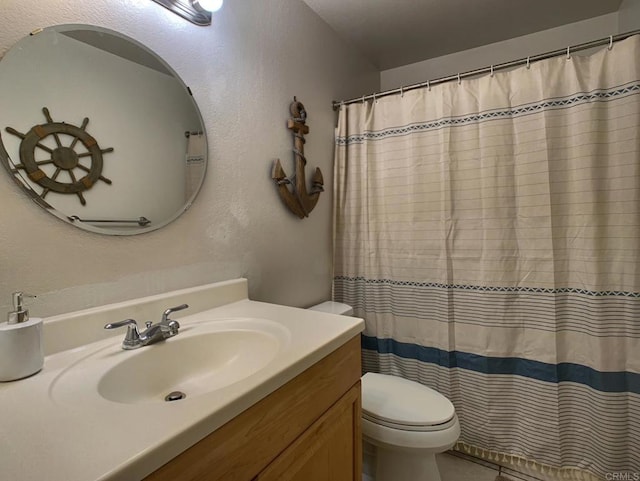 1466 15th St, Imperial Beach, CA 91932 - bathroom featuring toilet, vanity, a textured wall, and curtained shower