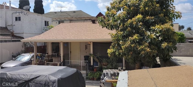 2006 W 12th St, Los Angeles, CA 90006 - view of front of home with a porch and roof with shingles