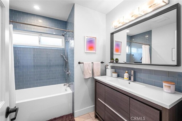 3440 Lemon Ave, Long Beach, CA 90807 - full bath featuring shower / bath combo, vanity, baseboards, backsplash, and tile patterned flooring