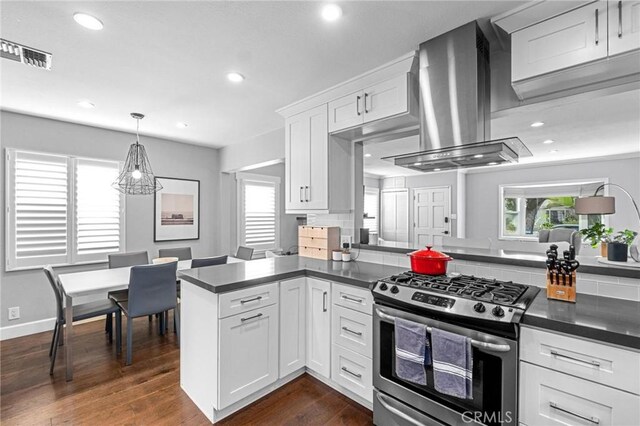 3440 Lemon Ave, Long Beach, CA 90807 - kitchen featuring gas range, range hood, dark countertops, white cabinets, and recessed lighting