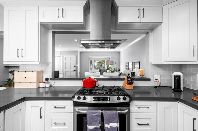3440 Lemon Ave, Long Beach, CA 90807 - kitchen with gas range, dark countertops, and white cabinetry