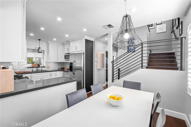 3440 Lemon Ave, Long Beach, CA 90807 - dining area with stairway, recessed lighting, baseboards, and dark wood finished floors