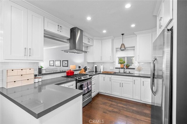 3440 Lemon Ave, Long Beach, CA 90807 - kitchen with extractor fan, stainless steel appliances, a sink, dark countertops, and a peninsula