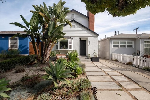 3440 Lemon Ave, Long Beach, CA 90807 - view of front of home featuring a chimney and stucco siding