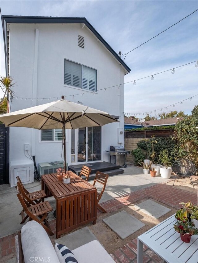 3440 Lemon Ave, Long Beach, CA 90807 - back of property featuring a patio and stucco siding