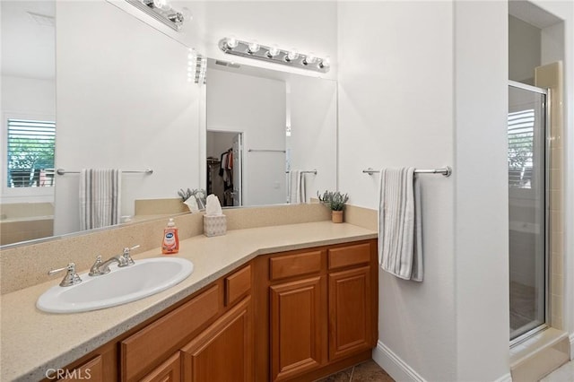 44774 Pride Mountain St, Temecula, CA 92592 - bathroom featuring a shower stall, vanity, and tile patterned flooring