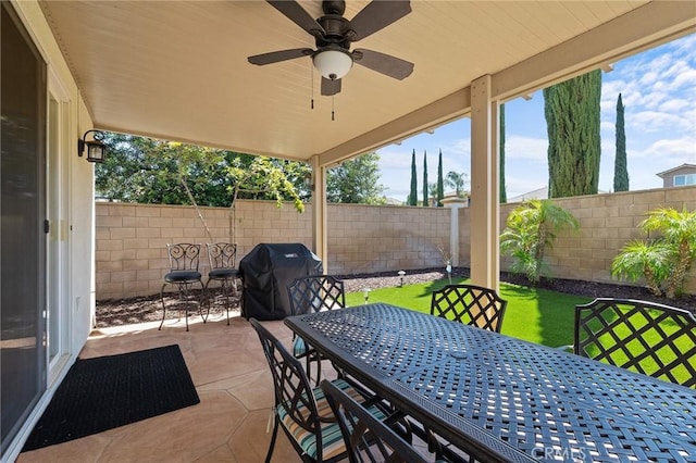 44774 Pride Mountain St, Temecula, CA 92592 - fenced backyard featuring outdoor dining space, a grill, a patio, and ceiling fan