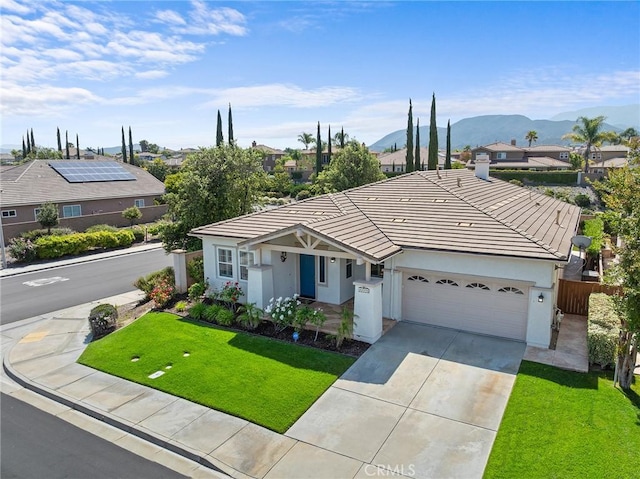 44774 Pride Mountain St, Temecula, CA 92592 - single story home featuring a garage, a tile roof, stucco siding, driveway, and a mountain view