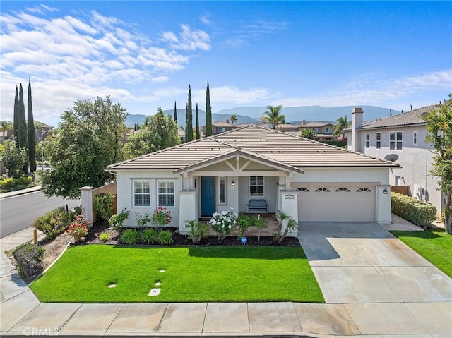 44774 Pride Mountain St, Temecula, CA 92592 - ranch-style house with a garage, concrete driveway, a front yard, and stucco siding
