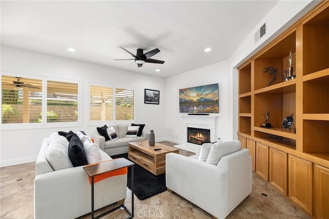 44774 Pride Mountain St, Temecula, CA 92592 - living room with ceiling fan, a glass covered fireplace, baseboards, and recessed lighting