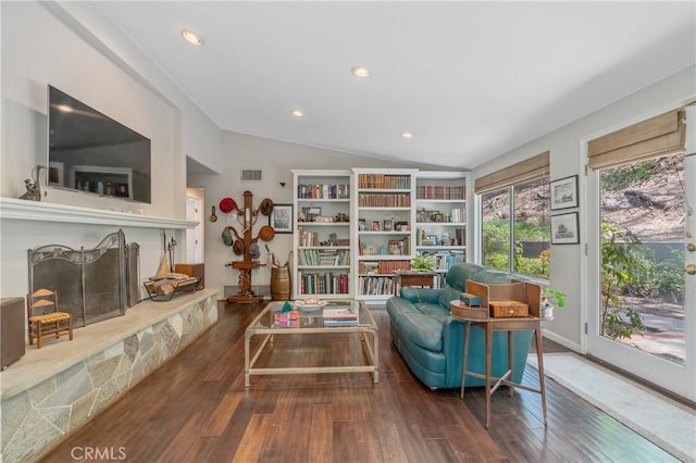 3818 Hayvenhurst Ave, Encino, CA 91436 - living area with lofted ceiling, wood-type flooring, recessed lighting, and a fireplace with raised hearth