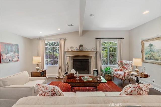 3818 Hayvenhurst Ave, Encino, CA 91436 - living area with wood finished floors, plenty of natural light, a fireplace with flush hearth, and recessed lighting